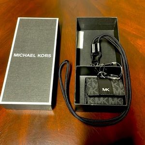 Michel Kors black signature print AirPods case and lanyard